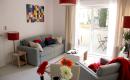  : Salon d'un appartement de la résidence seniors Cogedim Club Montpellier