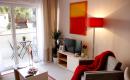  : Salon d'un appartement de la résidence Villa d'Hélios